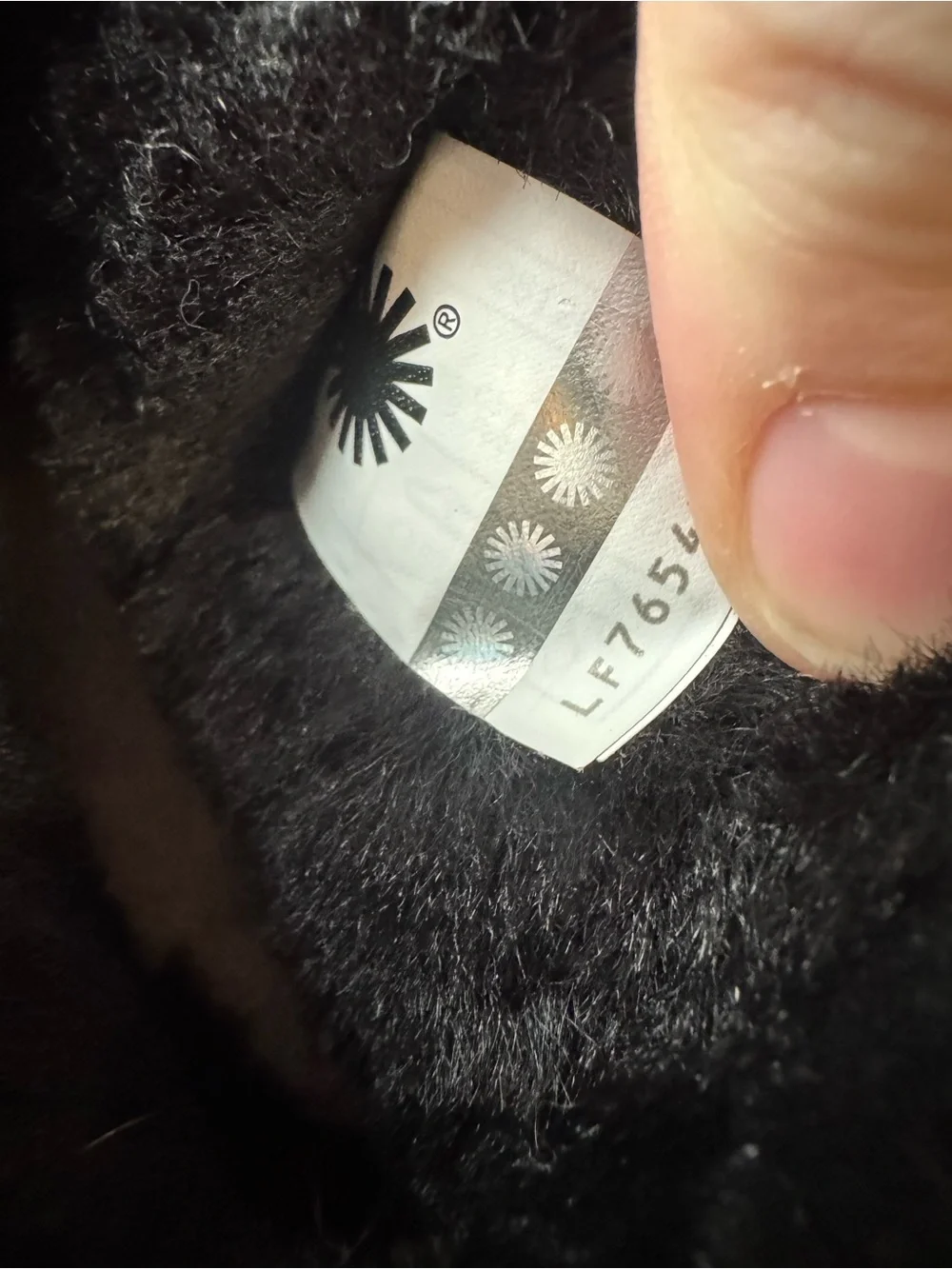 UGG Classic Mini Boot in Black Snow Leopard. Size 6 Youth/ 37 Euro. EUC